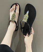 Flache Flip-Flops im Bohemien-Stil in Schwarz
